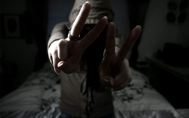 person making peace signs