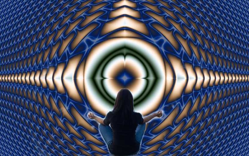 Person Meditating in Tunnel