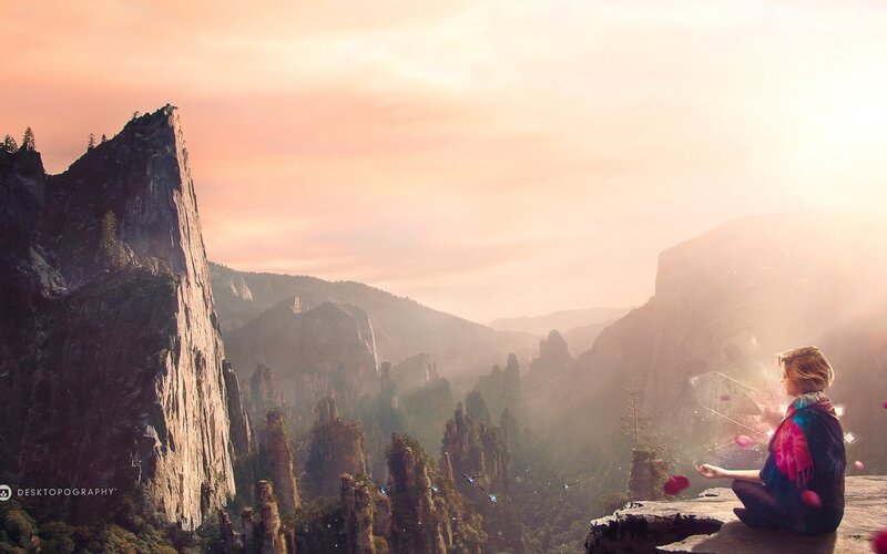 Person Meditating on Cliff