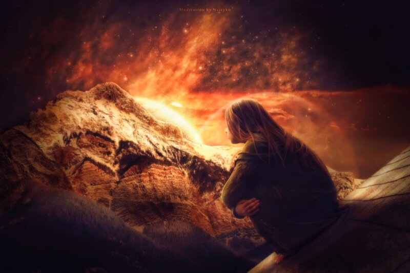 Person Meditating on Mountain
