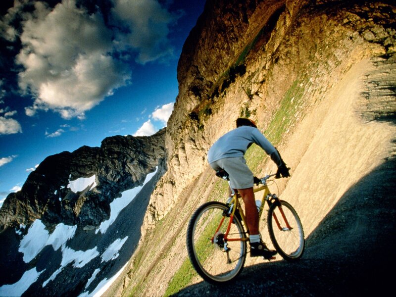 Person Mountain Biking