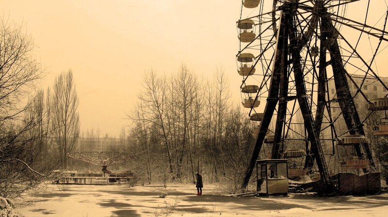 Person Near Ferris Wheel — Sepia