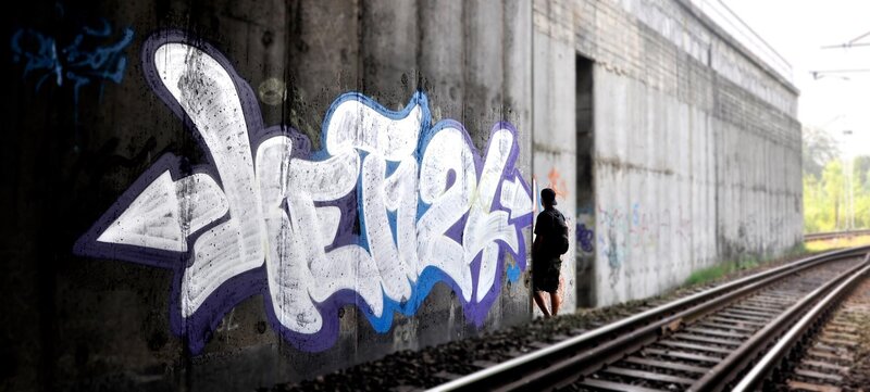 Person Near Train Tracks — Gray