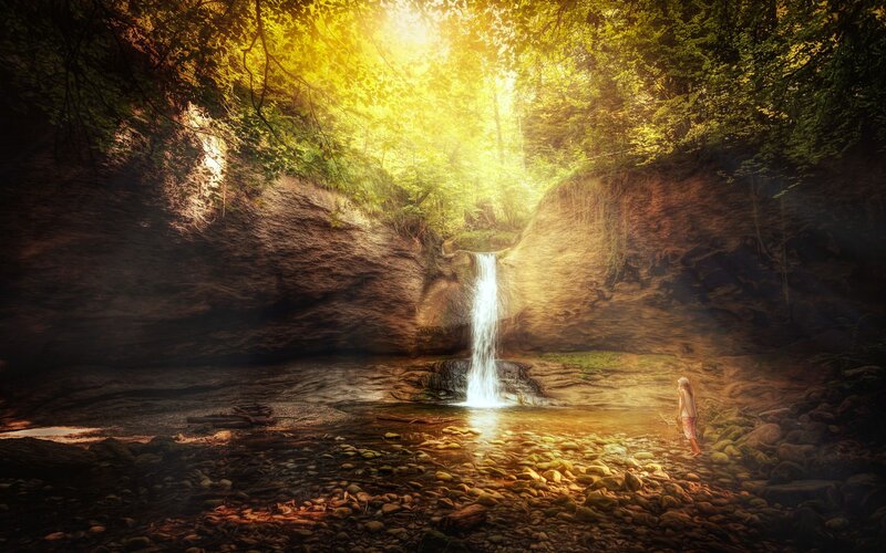 Person Near Waterfall — Yellow