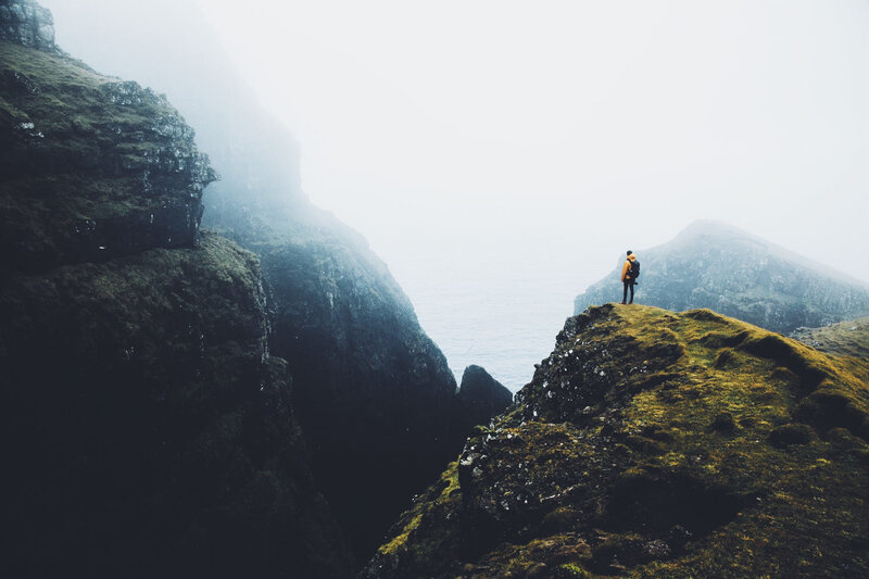 Person on a Cliff — Green, Misty