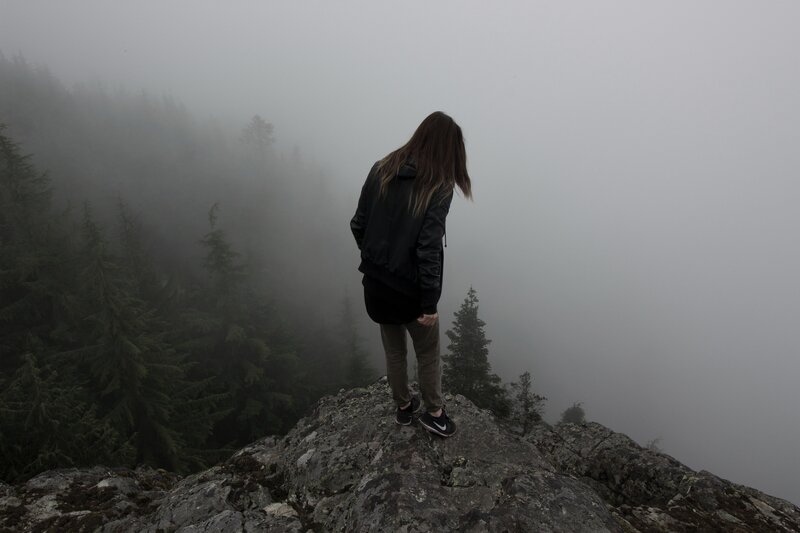 Person on a foggy mountain