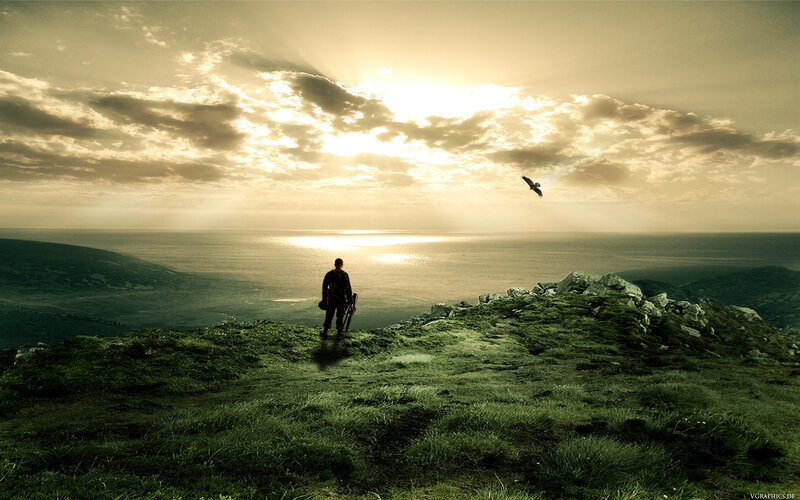 Person on a hill at sunset