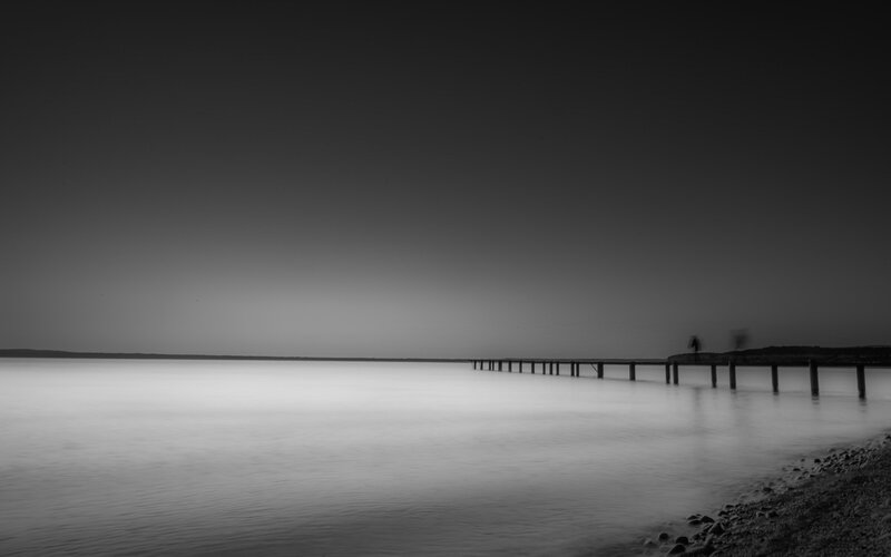 Person on a Pier — Black, Serene