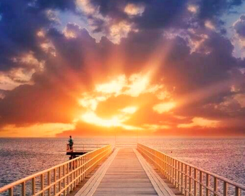Person on a Pier — Orange, Dramatic, Sunset