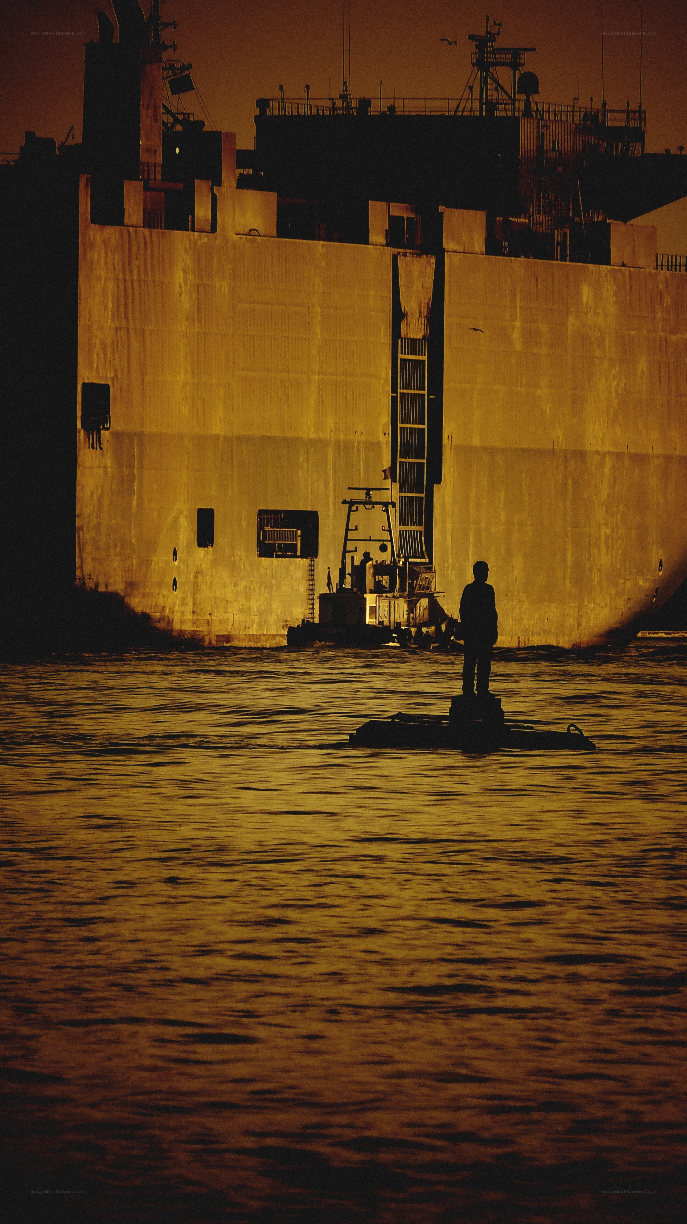 person on a platform in water
