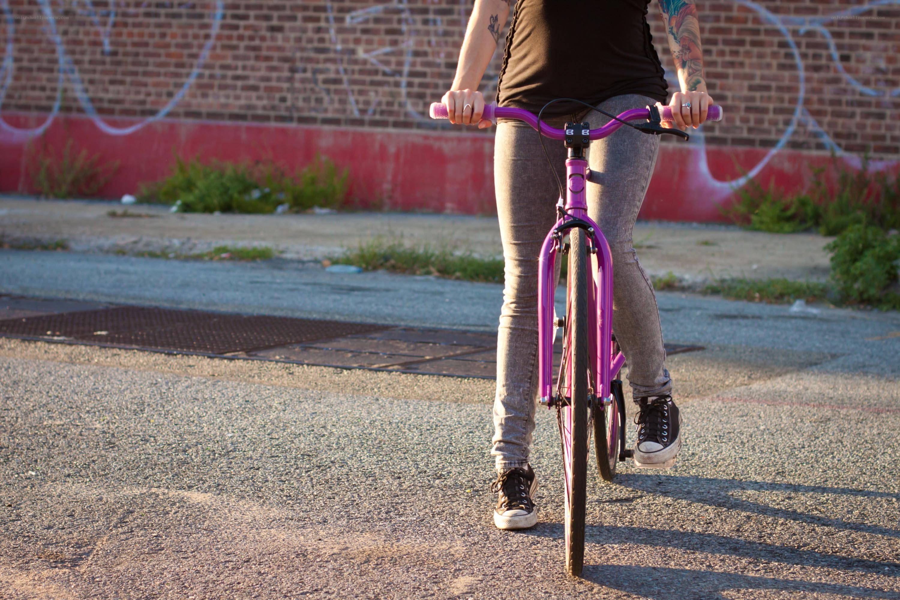 person on a purple bike