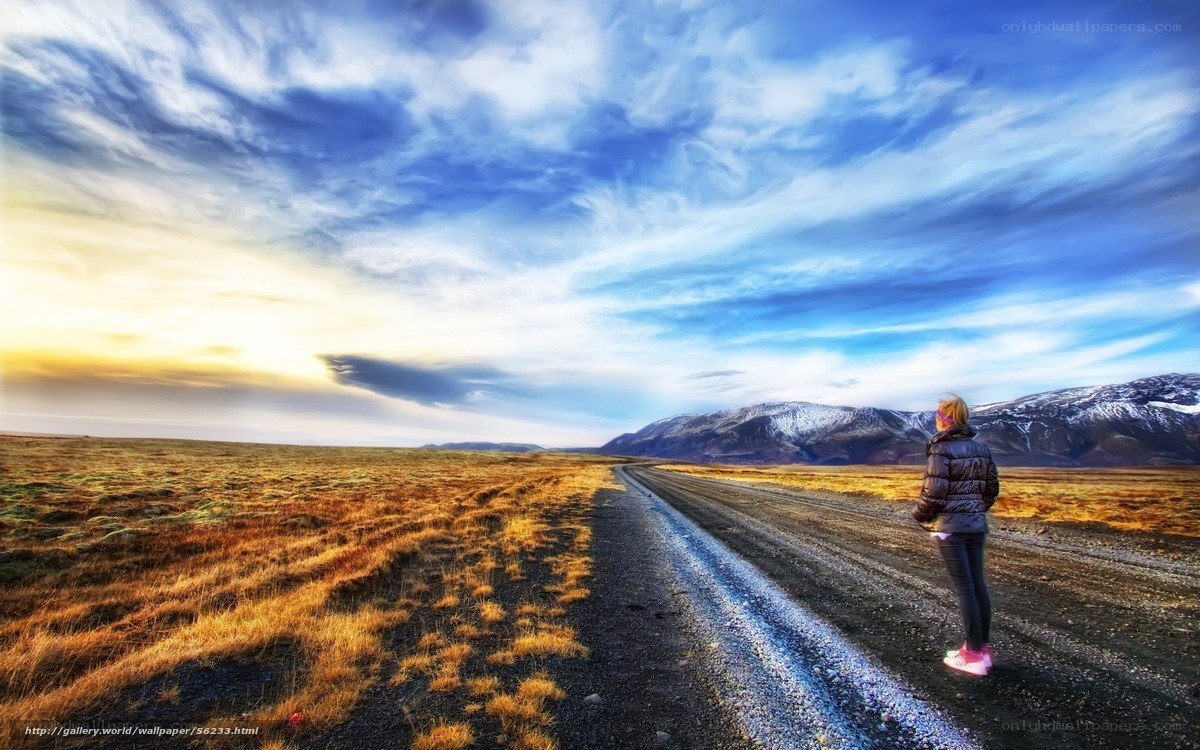Person on a road at sunset