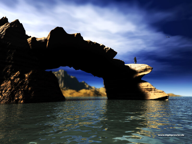 Person on a rock arch by the sea