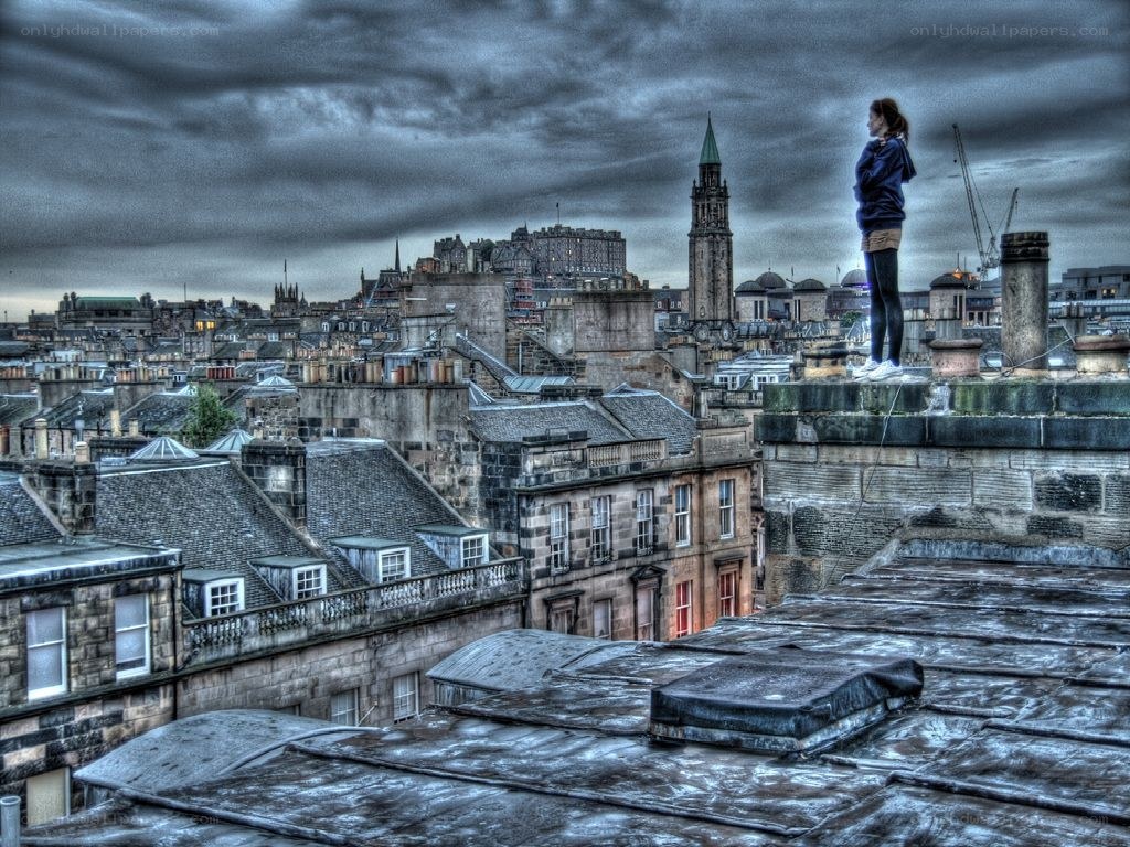Person on a rooftop in Edinburgh