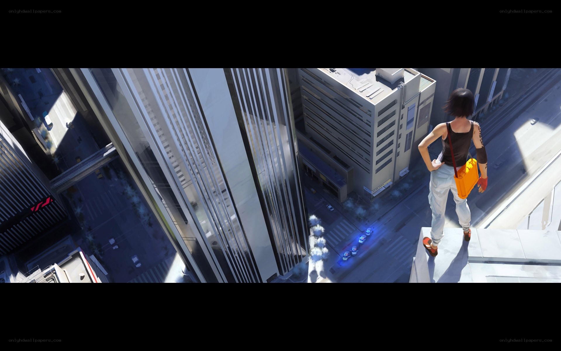 person on a rooftop overlooking city
