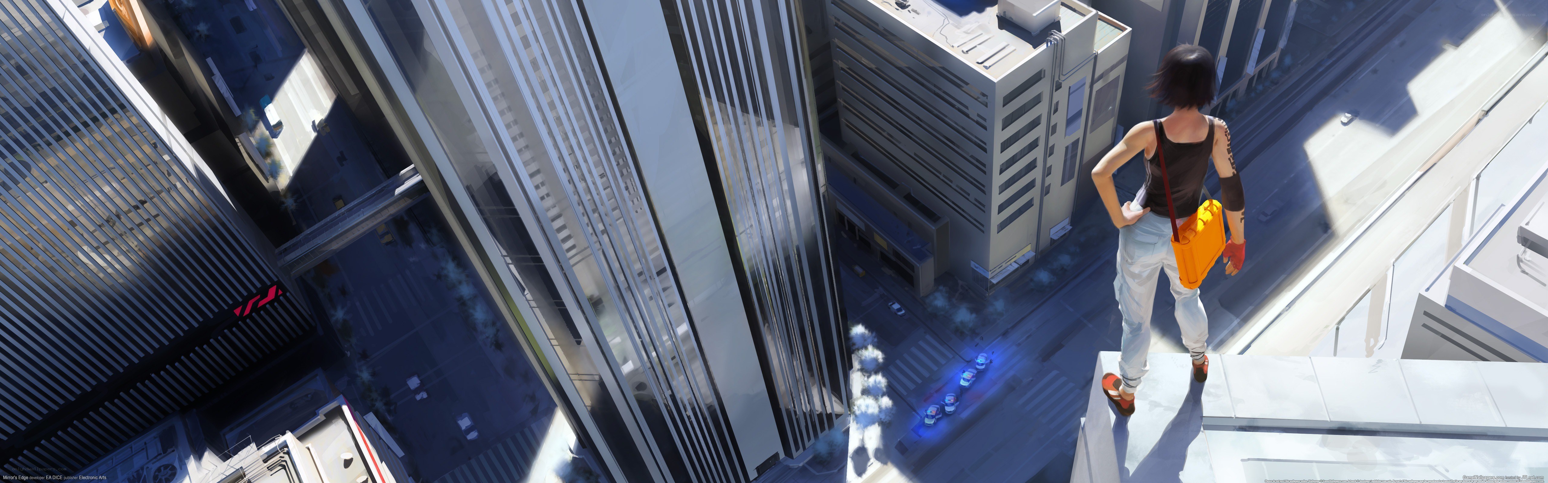 person on a rooftop overlooking the city