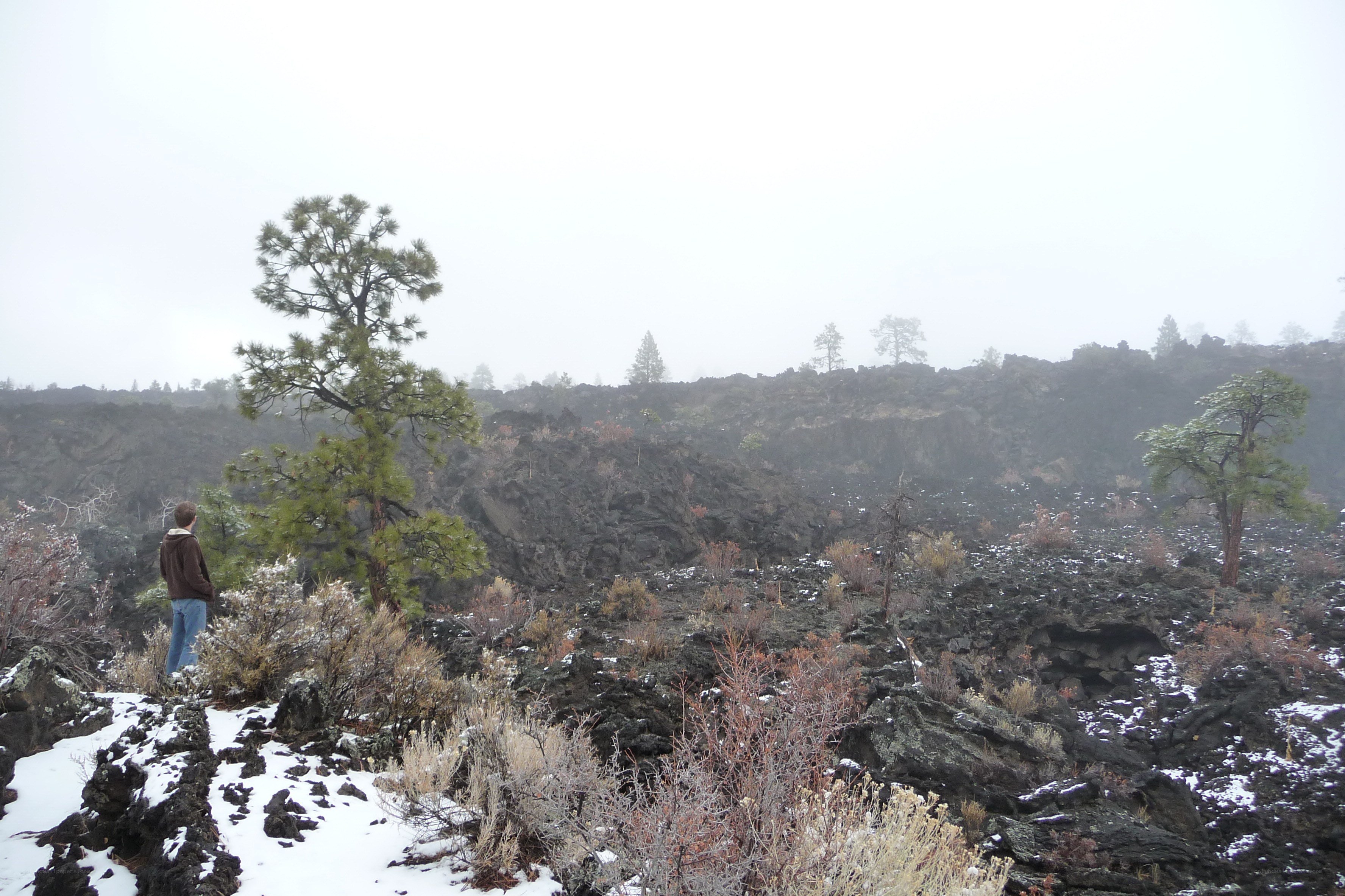 Person on a snowy lava field