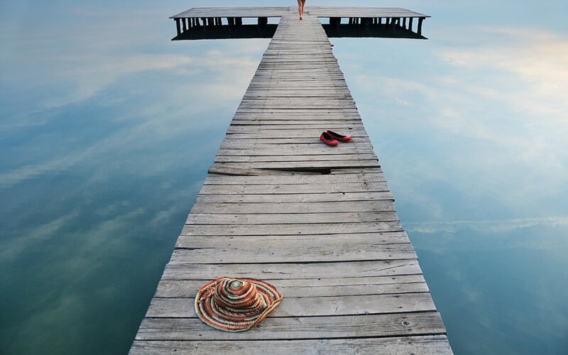 Person on a wooden pier