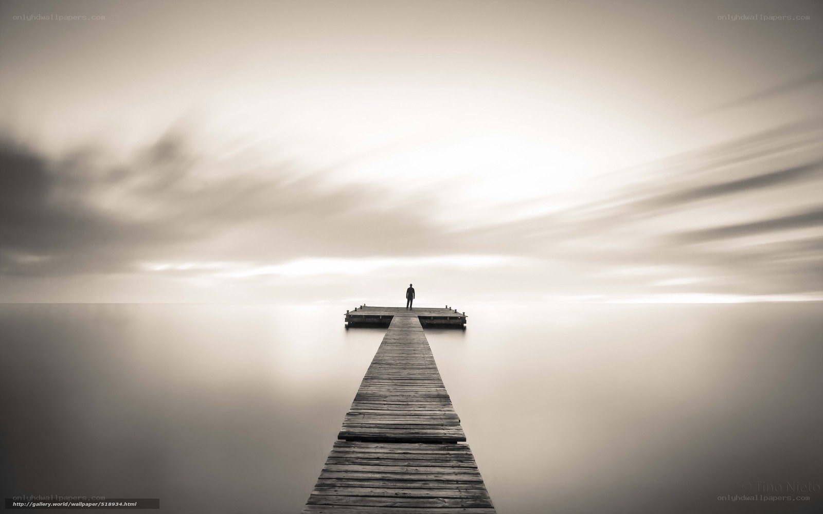 Person on a wooden pier