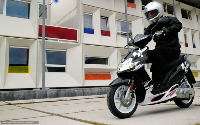 Person on a Yamaha scooter
