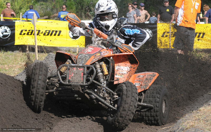 Person on ATV in Mud — Orange