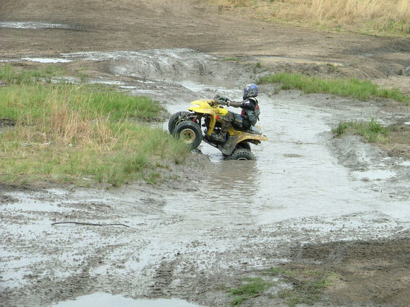 Person on ATV in Mud
