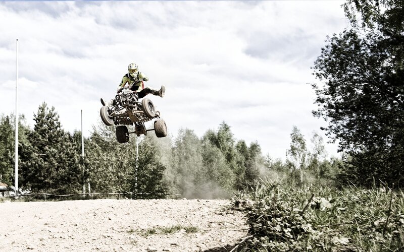 Person on ATV Mid-air — Green