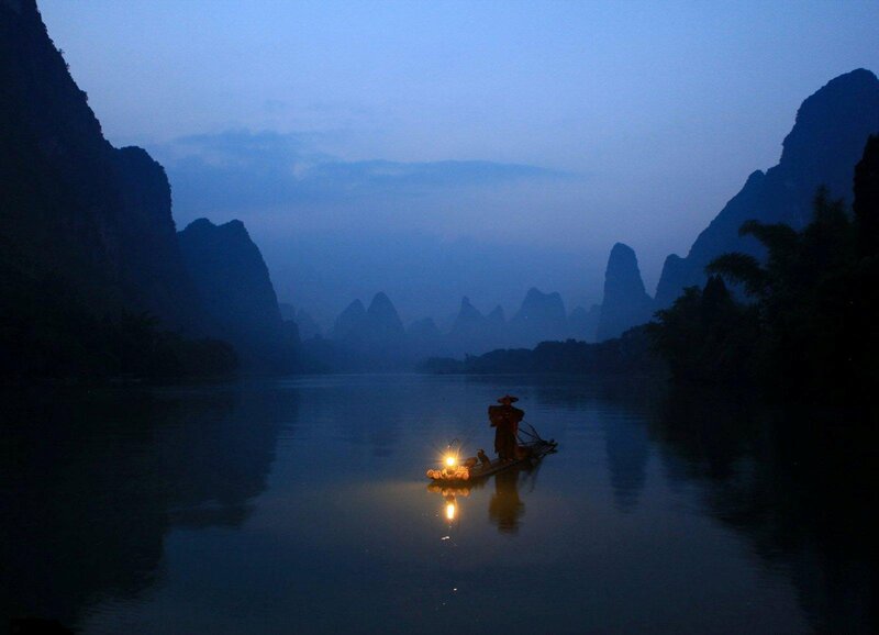 Person on Bamboo Raft