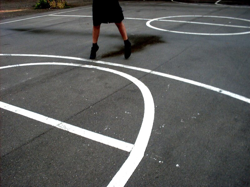 person on basketball court