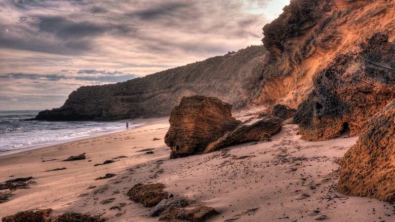 Person on Beach at Sunset — Brown, Dramatic