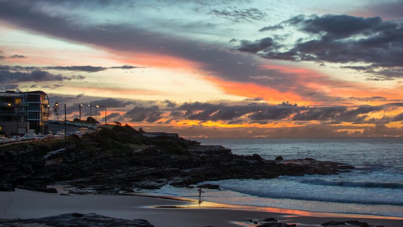 Person on Beach at Sunset — Orange, Dramatic, Photograph, Building