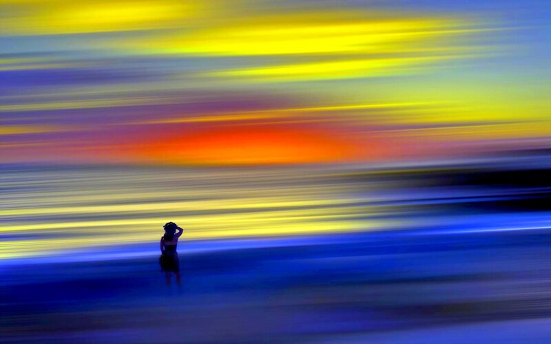 Person on Beach at Sunset — Yellow, Dramatic, Photograph