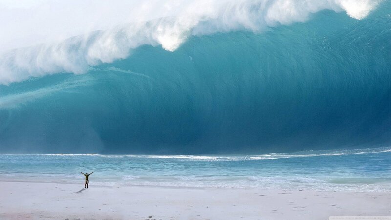 Person on Beach Facing Wave — Blue