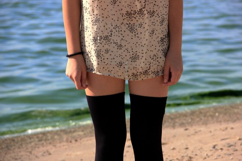 person on beach in dress