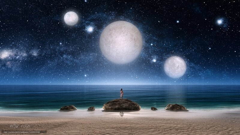 Person on beach with multiple moons