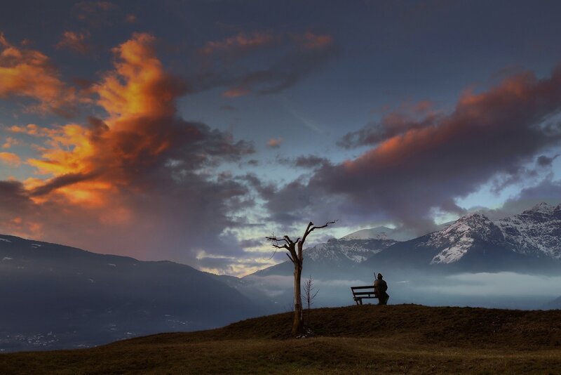 Person on Bench at Sunset — Orange, Dramatic