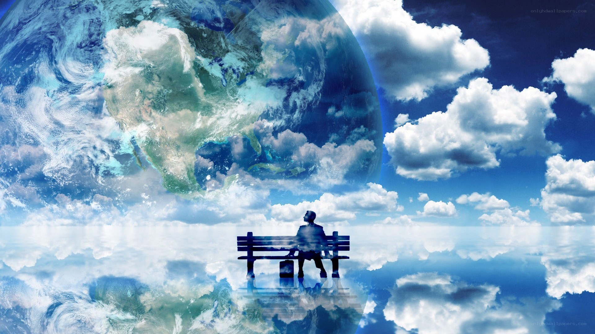 person on bench with Earth view