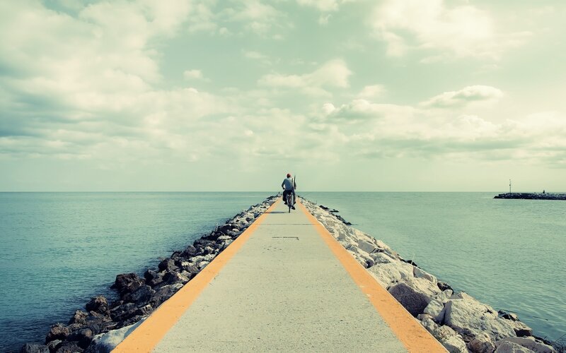 Person on Bicycle — Blue, Serene, Afternoon, Photograph, Pier, Ocean