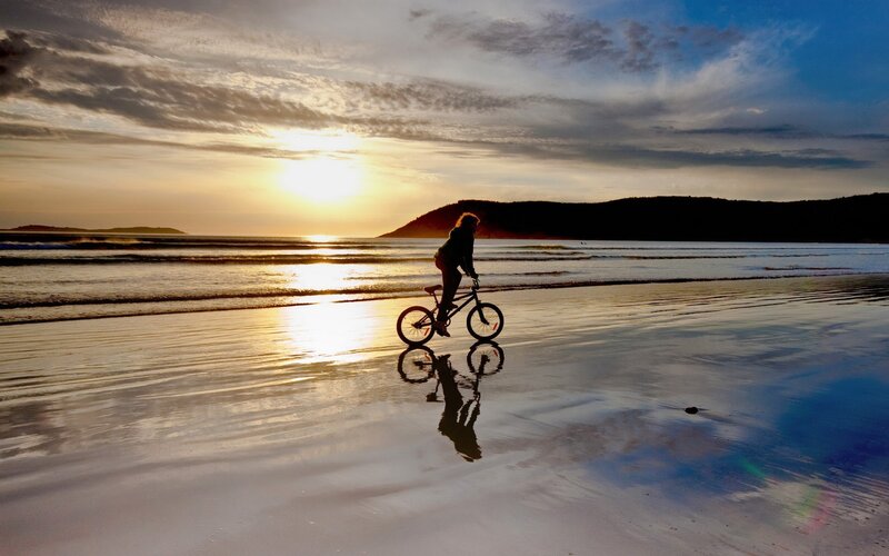 Person on Bicycle — Blue, Serene, Sunset, Photograph, Beach, Ocean