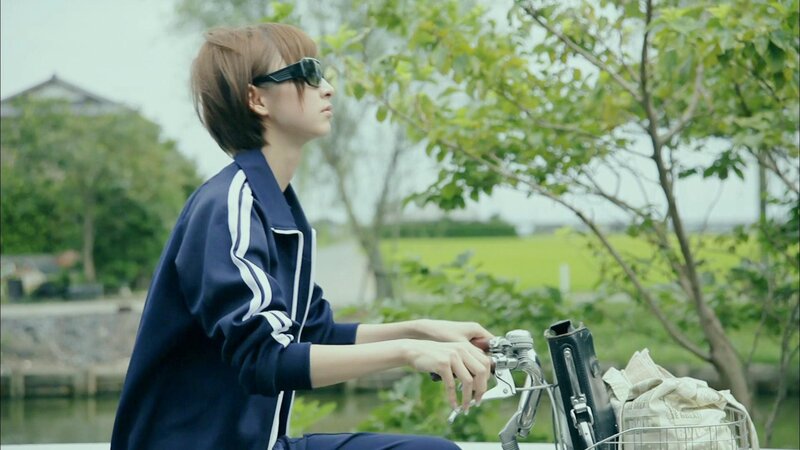 person on bicycle in park