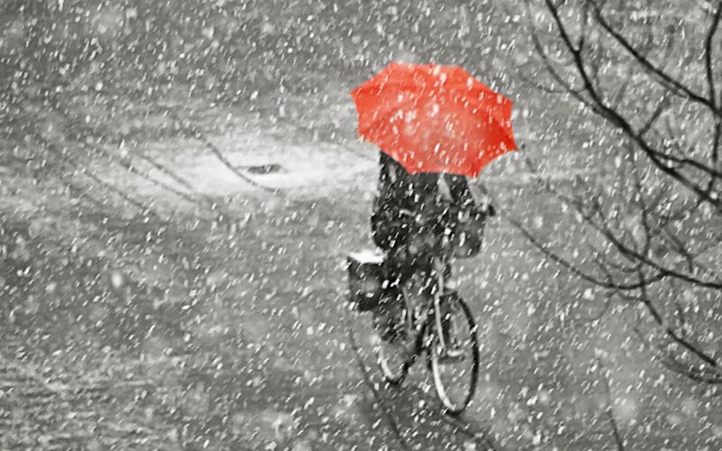 Person on Bicycle in Snow