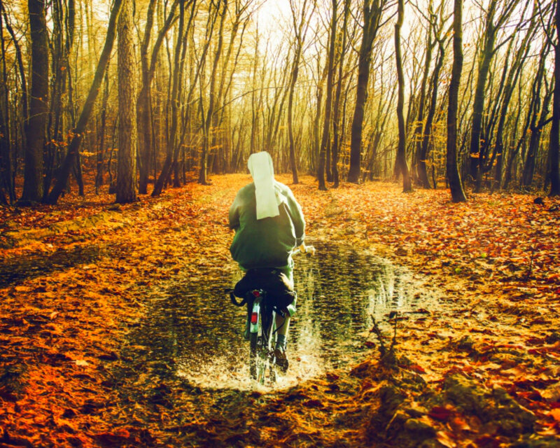 Person on Bicycle — Orange