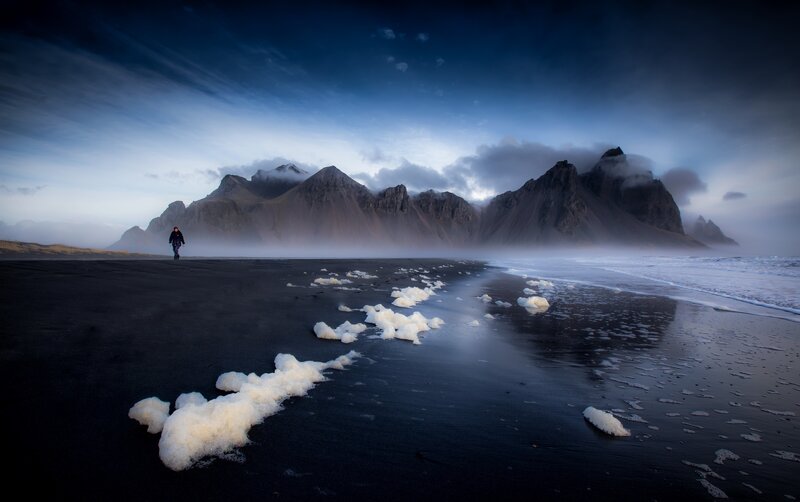 Person on Black Sand Beach — Dramatic, Night