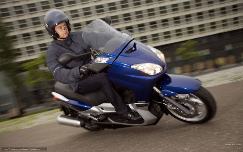 Person on Blue Scooter — Dynamic, Afternoon, Photograph
