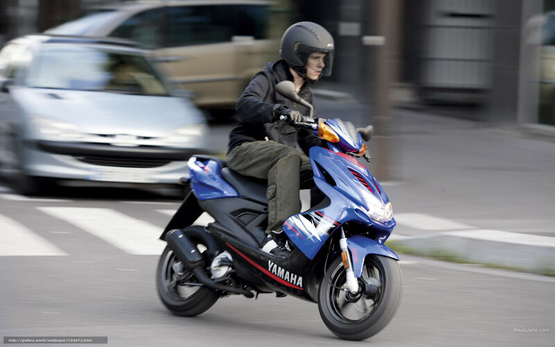 Person on Blue Scooter