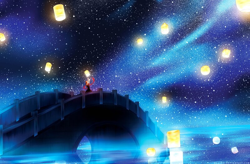 Person on Bridge Releasing Lanterns