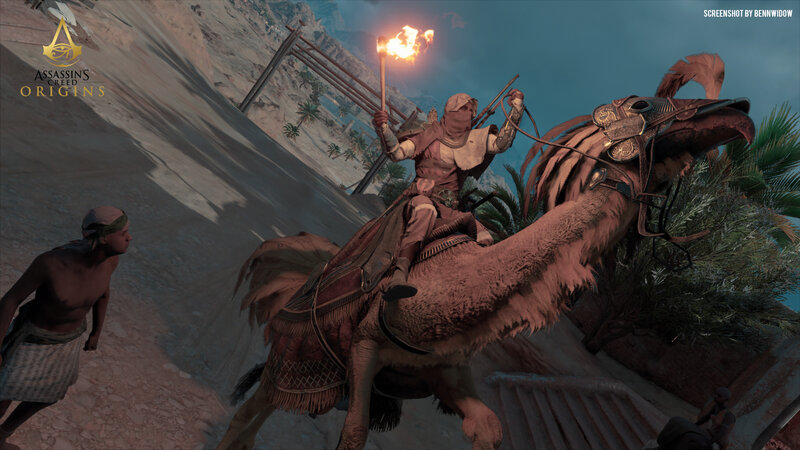 Person on Camel with Torch