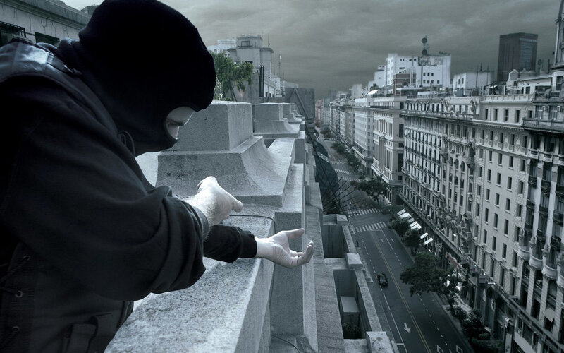 person on city balcony