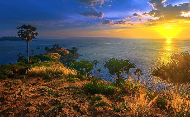 Person on Cliff at Sunset