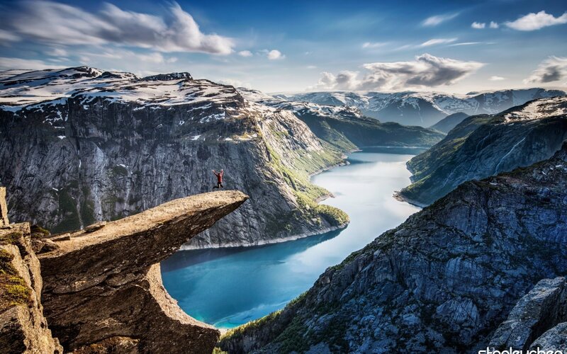 Person on Cliff Edge — Blue, Dramatic, Afternoon, Photograph, Mountain